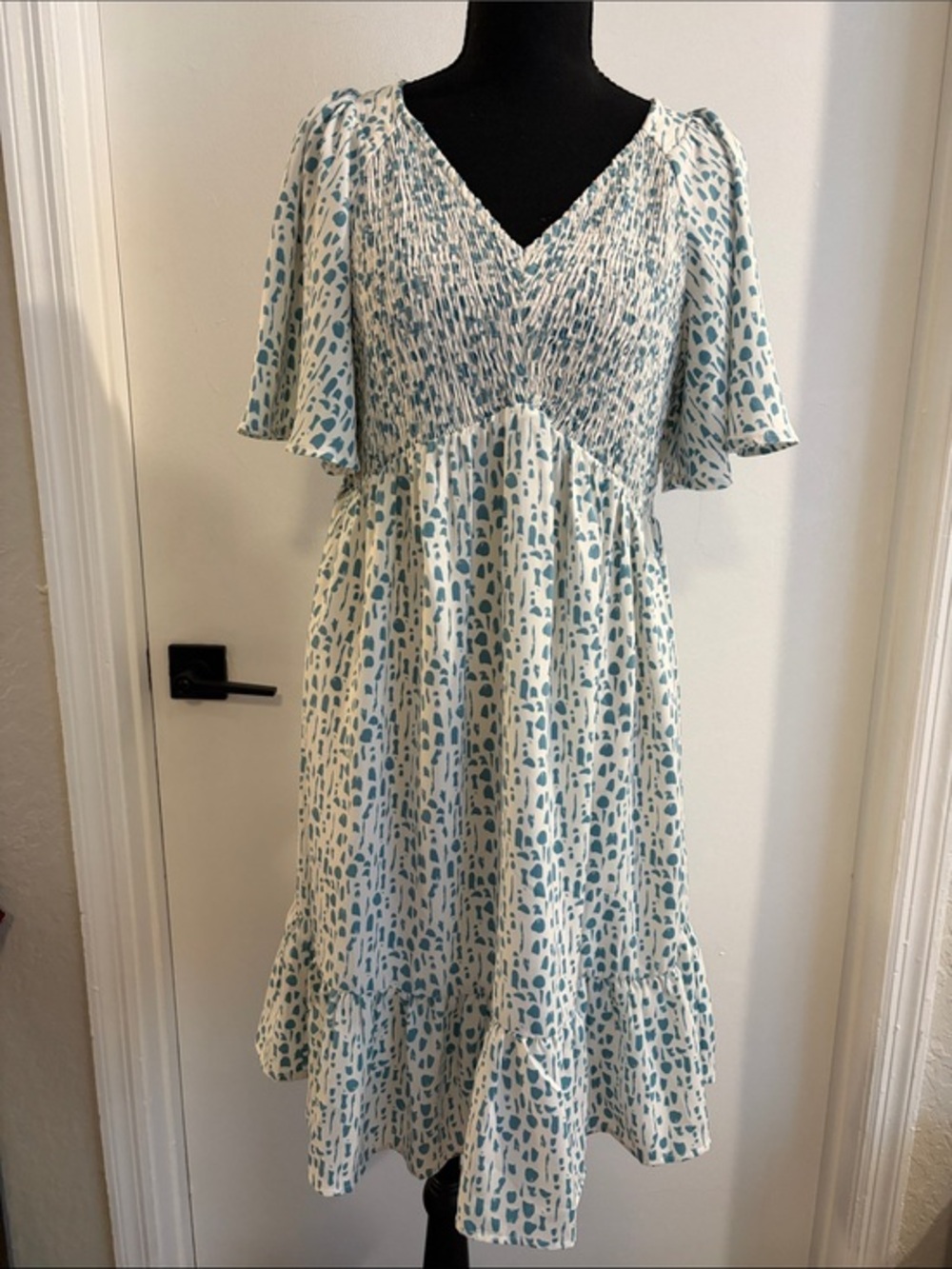Jodifl babydoll dress with white and blueish green pattern size medium